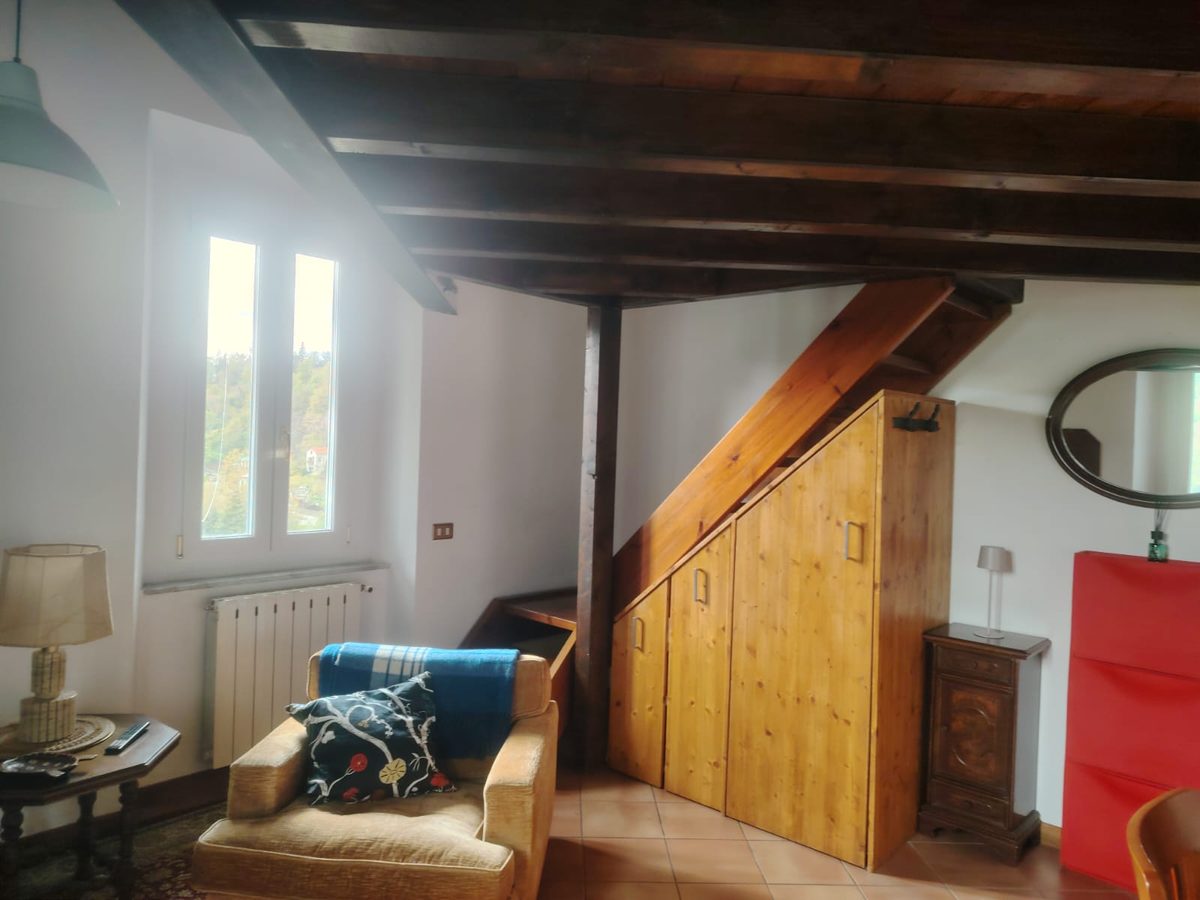 Reading nook under the attic with built-in storage
